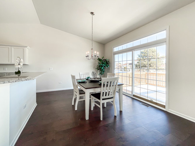 455 Ridge Lane Bolingbrook, IL 60440 - Photo 5 of 14 a view of a dining room with furniture window and wooden floor