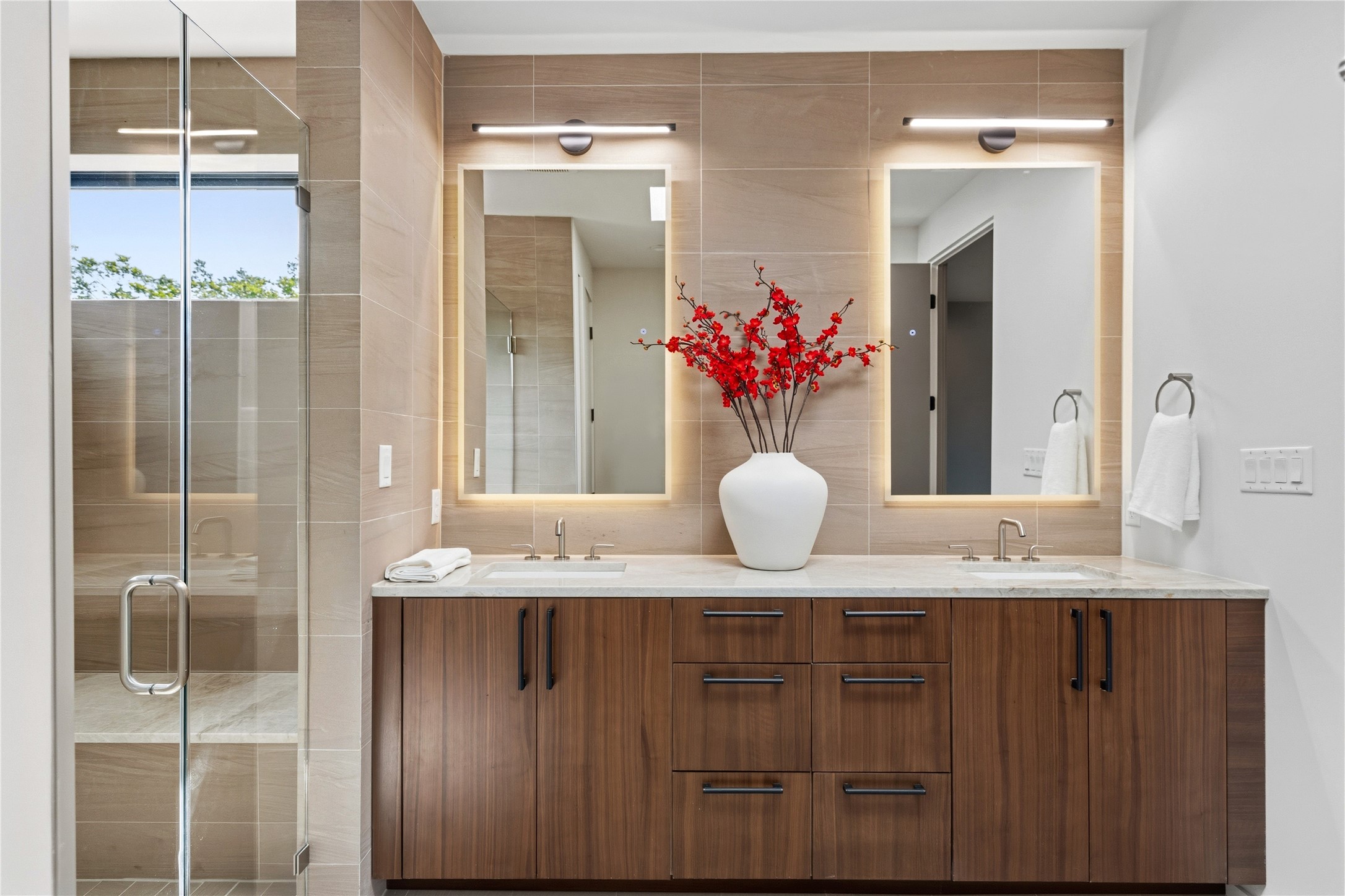 1912 South 3rd Street Austin, TX 78704 - Photo 13 of 21 a bathroom with a granite countertop sink a mirror and a shower