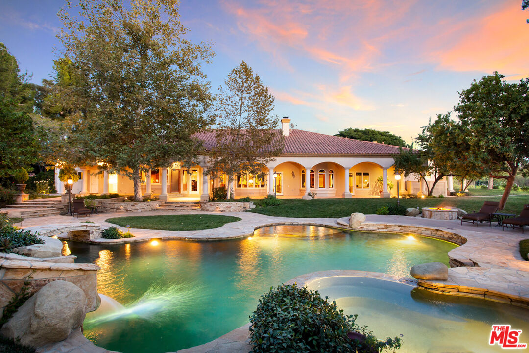 9269 Stockton Road Moorpark, CA 93021 - Photo 2 of 46 a view of swimming pool with outdoor seating and lake view