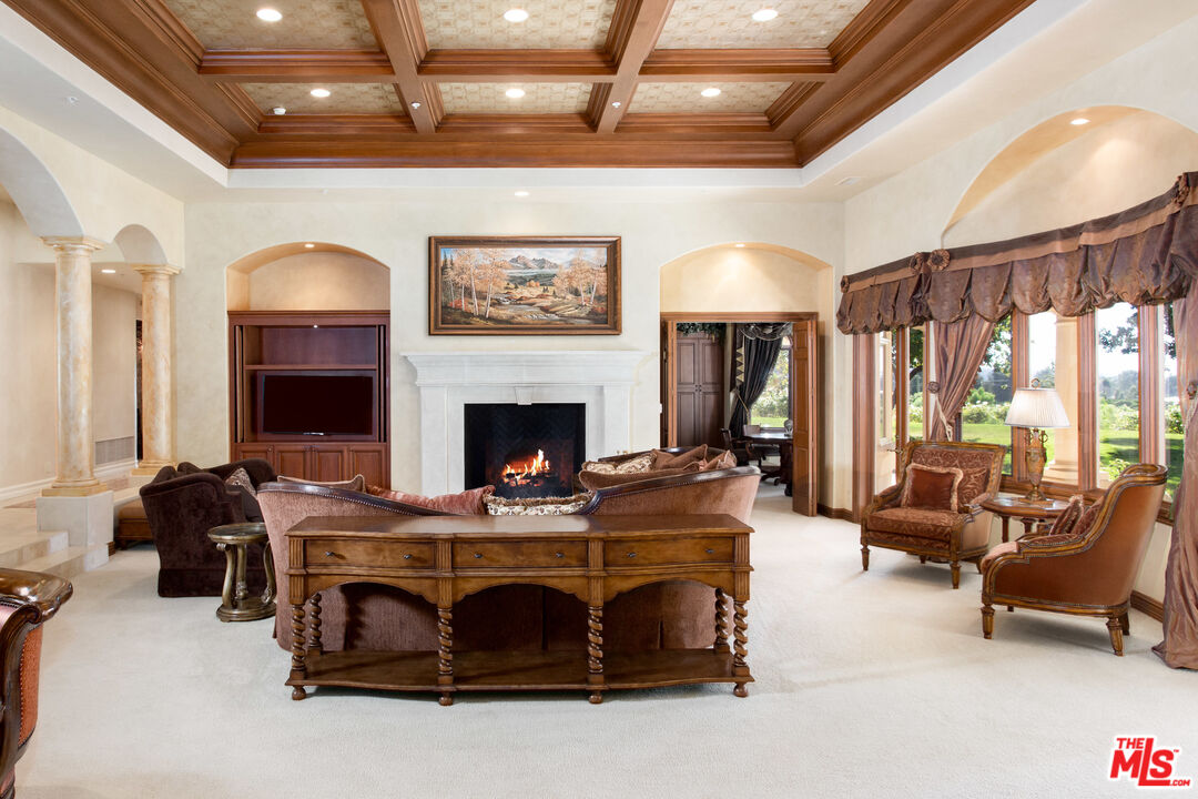 9269 Stockton Road Moorpark, CA 93021 - Photo 12 of 46 a living room with furniture and a fireplace