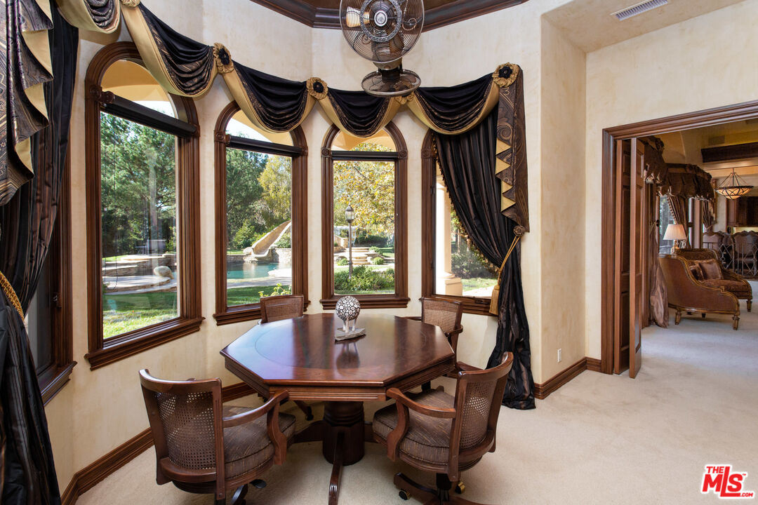 9269 Stockton Road Moorpark, CA 93021 - Photo 16 of 46 a view of a dining room with furniture window and outside view