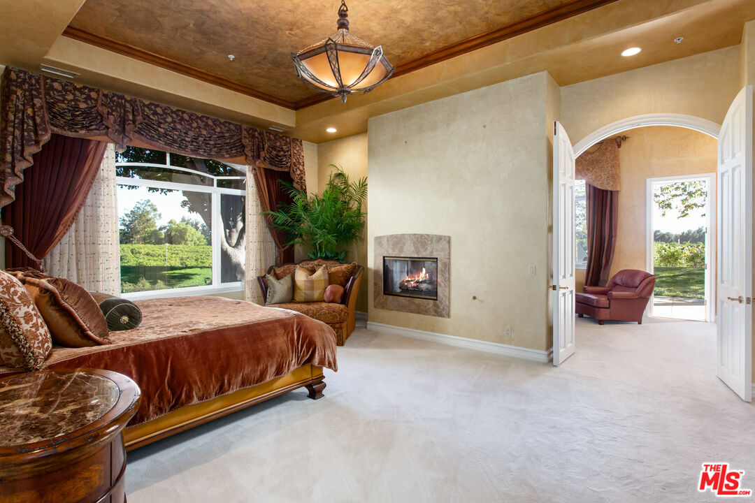 9269 Stockton Road Moorpark, CA 93021 - Photo 18 of 46 a bedroom with furniture and a large window