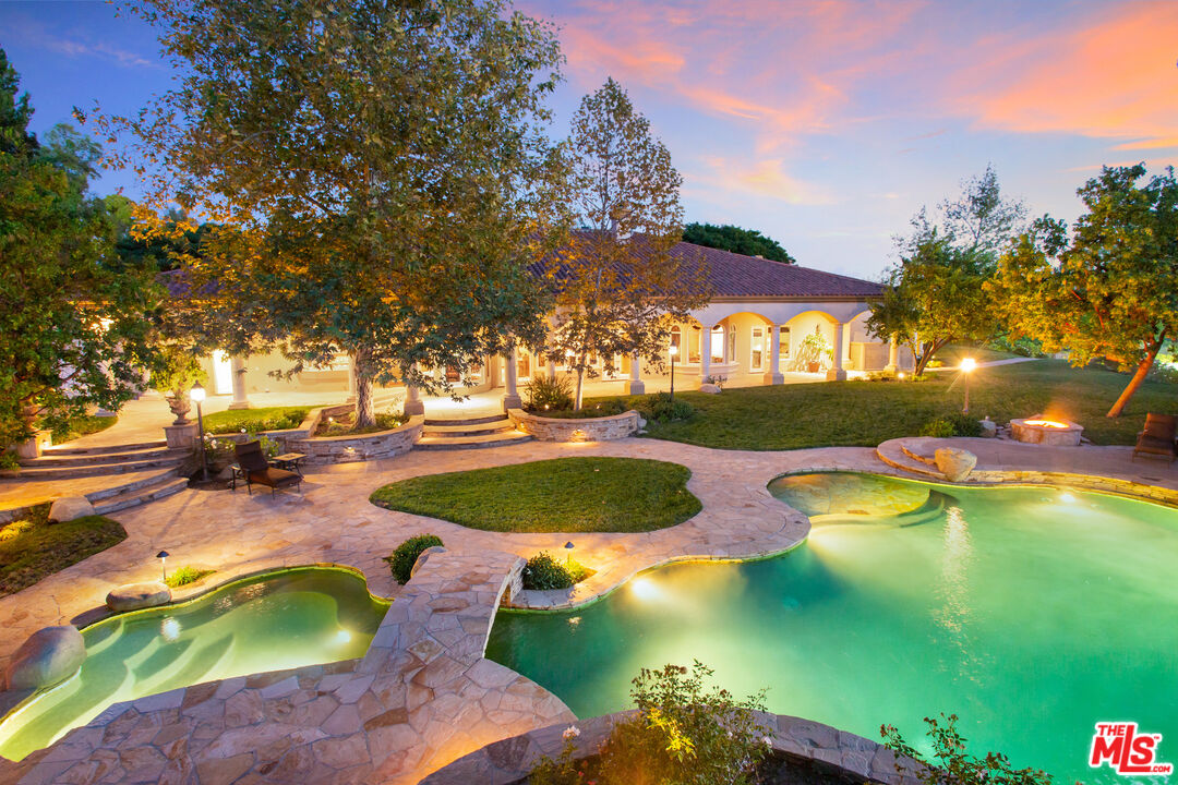 9269 Stockton Road Moorpark, CA 93021 - Photo 23 of 46 a view of an swimming pool with outdoor seating