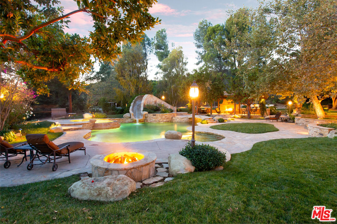 9269 Stockton Road Moorpark, CA 93021 - Photo 24 of 46 a swimming pool with outdoor seating and yard