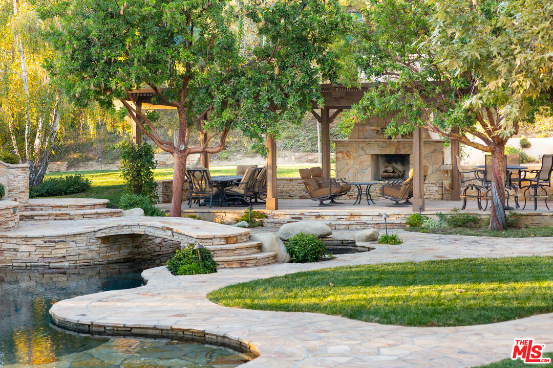 9269 Stockton Road Moorpark, CA 93021 - Photo 31 of 46 a view of a swimming pool with sitting area