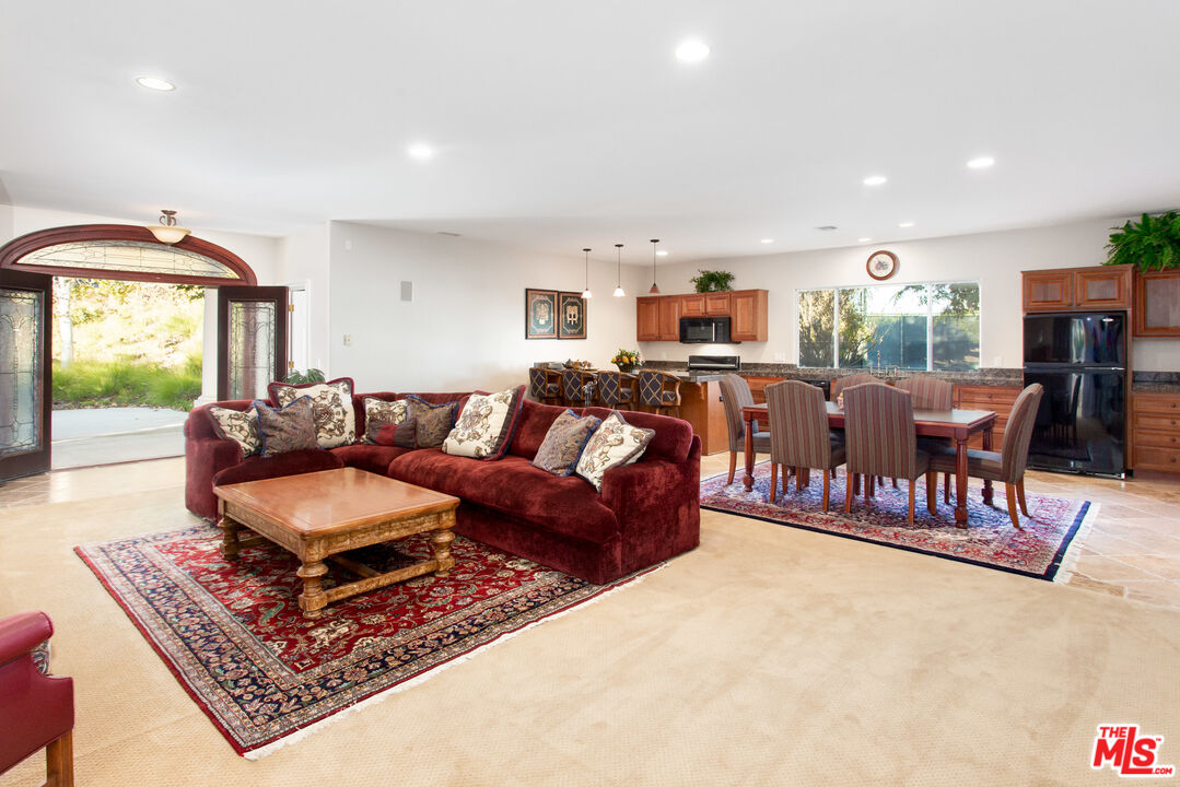 9269 Stockton Road Moorpark, CA 93021 - Photo 41 of 46 a living room with furniture and a large window