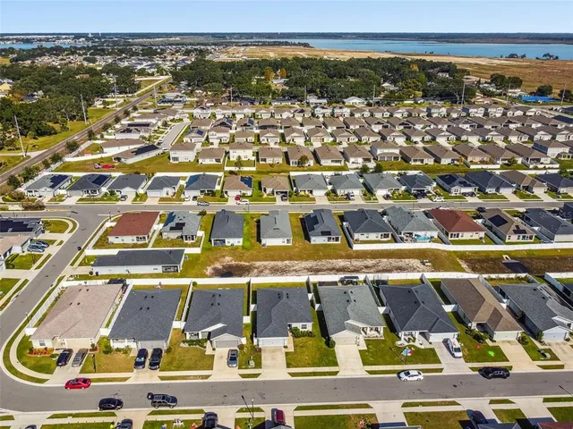 an aerial view of residential building and parking space