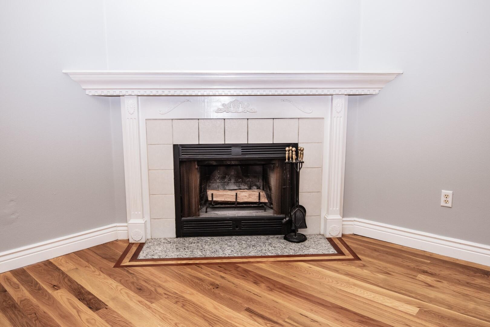 607 Risen Star Drive Crestview, FL 32539 - Photo 11 of 35 a living room with a fireplace