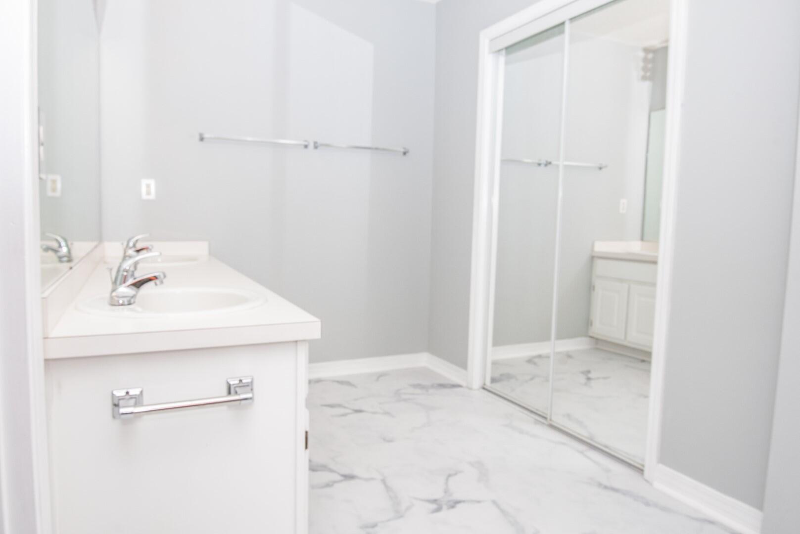 607 Risen Star Drive Crestview, FL 32539 - Photo 26 of 35 a bathroom with a sink a toilet and shower
