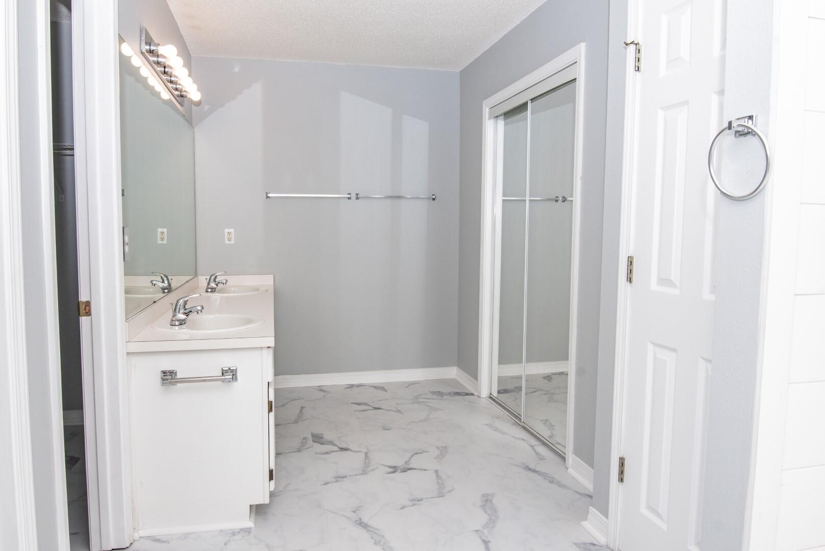 607 Risen Star Drive Crestview, FL 32539 - Photo 28 of 35 a bathroom with a sink a toilet and shower