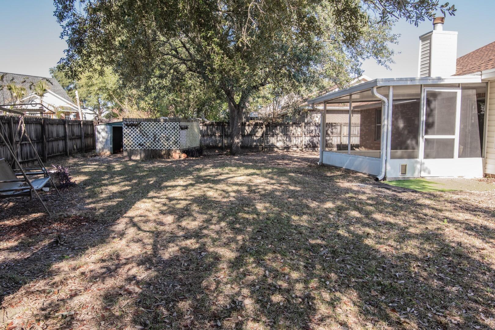 607 Risen Star Drive Crestview, FL 32539 - Photo 35 of 35 a view of a house with a yard