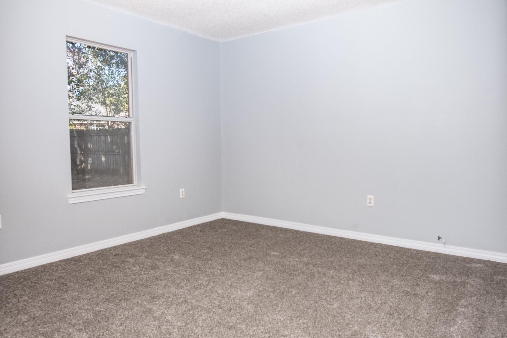 607 Risen Star Drive Crestview, FL 32539 - Photo 10 of 35 an empty room with a window