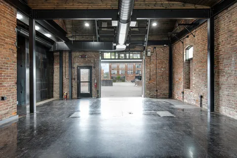 a view of lobby with furniture and floor to ceiling window