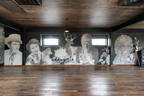 a view of wooden floor and dining room