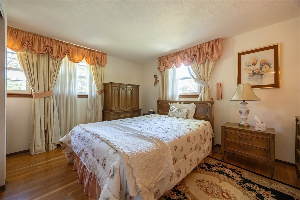 21 Trinity Drive Milford, MA 01757 - Photo 18 of 38 a bedroom with a bed and a window