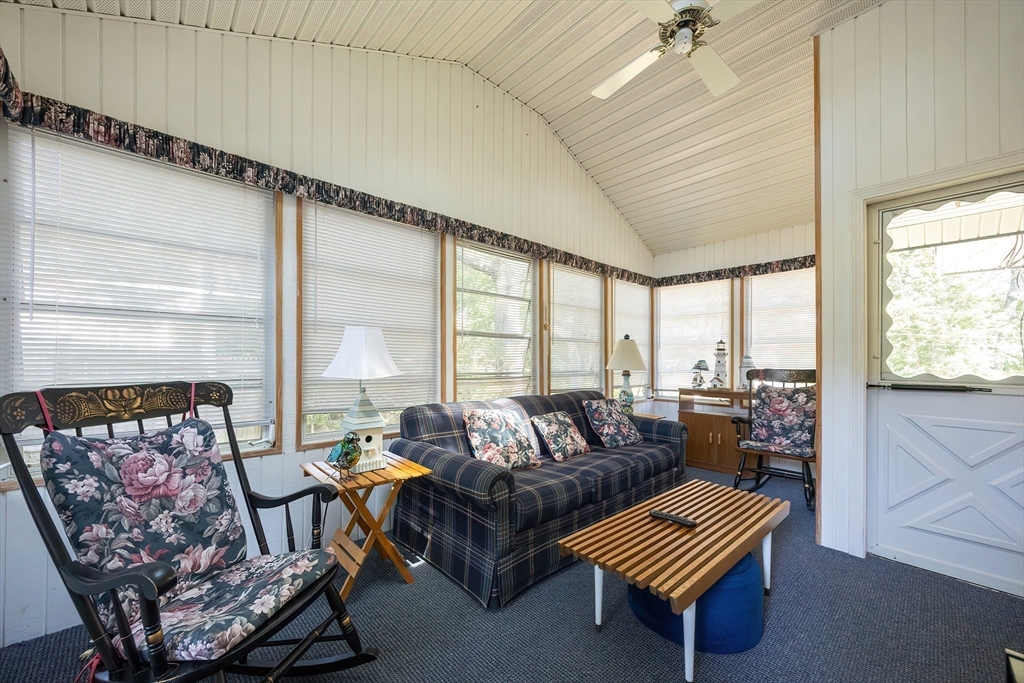 21 Trinity Drive Milford, MA 01757 - Photo 28 of 38 a living room with furniture and a window