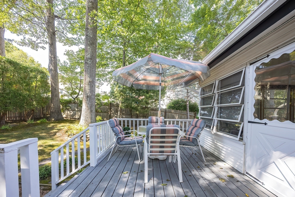 21 Trinity Drive Milford, MA 01757 - Photo 32 of 38 a view of a chairs and table in the balcony