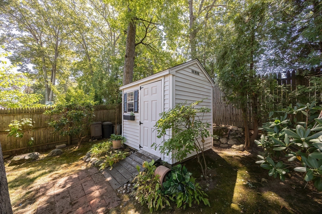 21 Trinity Drive Milford, MA 01757 - Photo 35 of 38 a backyard of a house with lots of green space