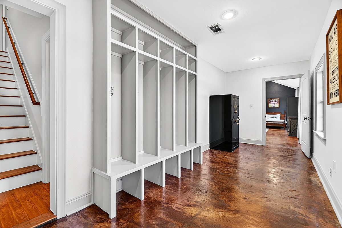 301 Medlin Creek Loop Dripping Springs, TX 78620 - Photo 25 of 40 Mudroom featuring baseboards and concrete flooring