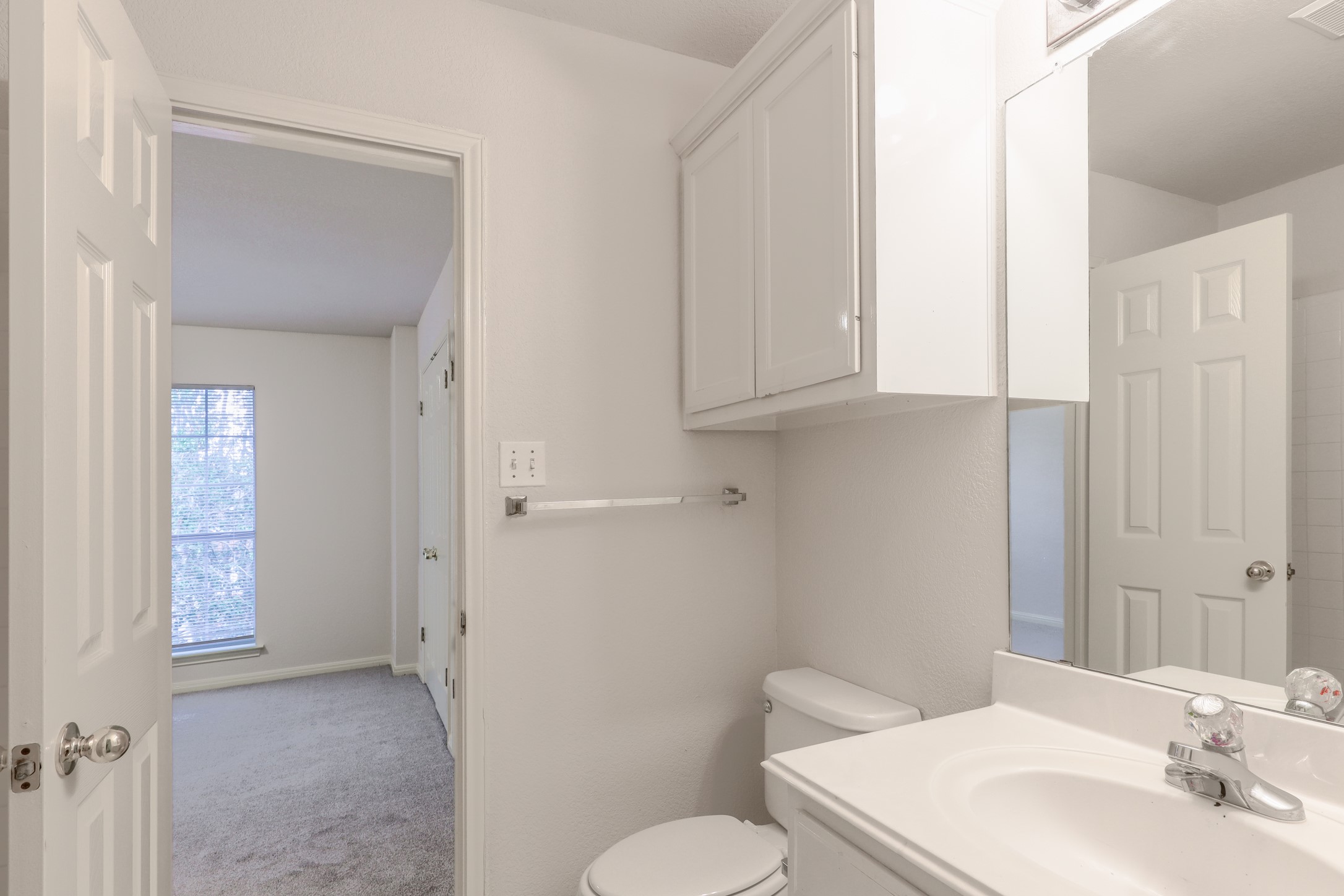 10225 Open Gate Drive Austin, TX 78726 - Photo 26 of 34 a bathroom with a sink and a toilet