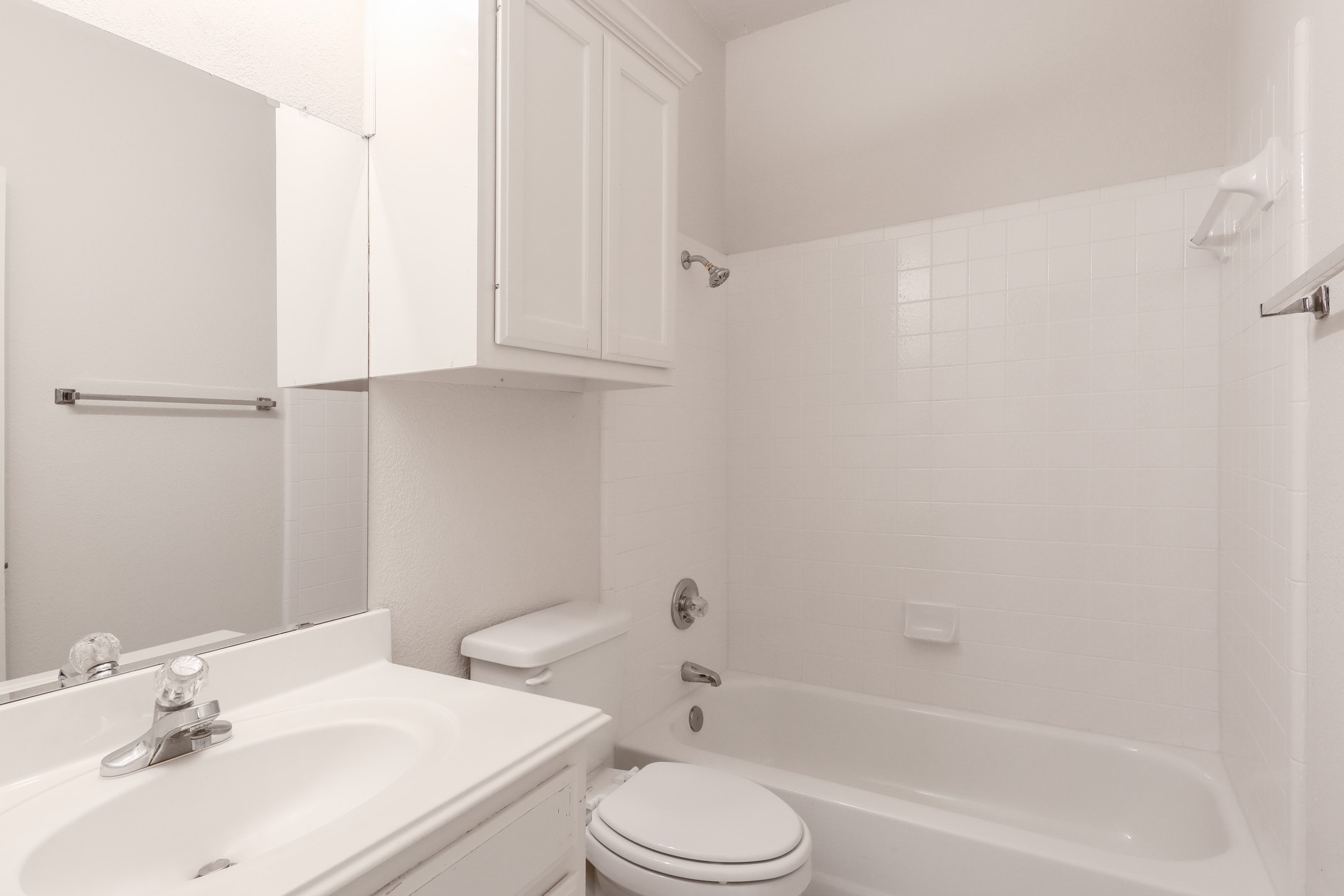 10225 Open Gate Drive Austin, TX 78726 - Photo 9 of 34 a bathroom with a sink toilet and vanity