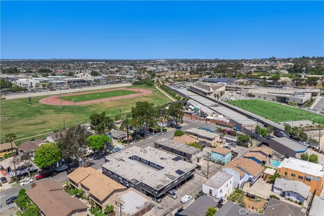 an aerial view of a city and lake view