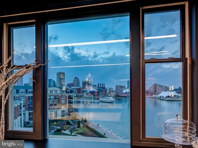 a kitchen with stainless steel appliances granite countertop a stove and cabinets
