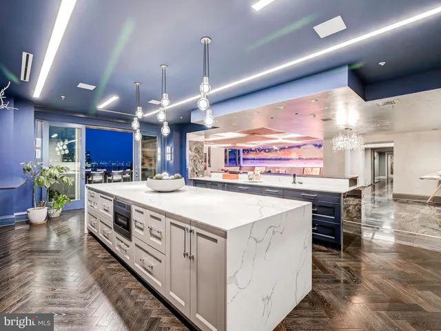 a bed room with furniture and wooden floor