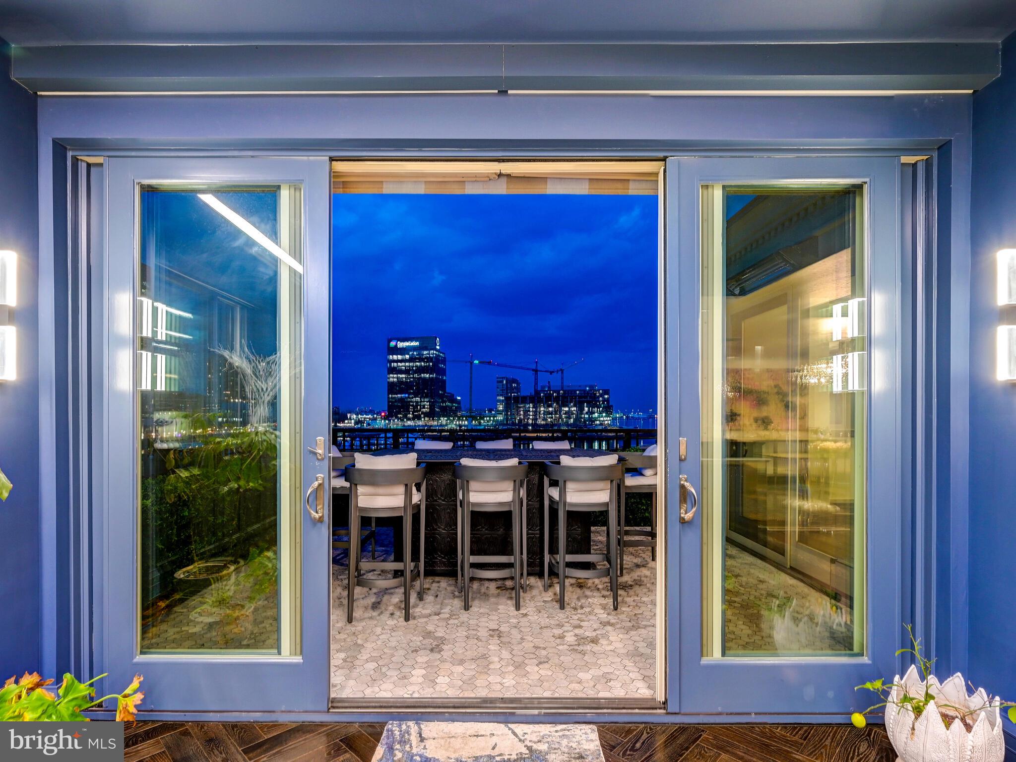801 Key Highway, Unit P54 Baltimore, MD 21230 - Photo 25 of 81 a view of a house with a porch and furniture