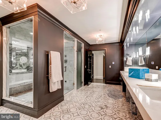 a view of a balcony with furniture and a potted plant