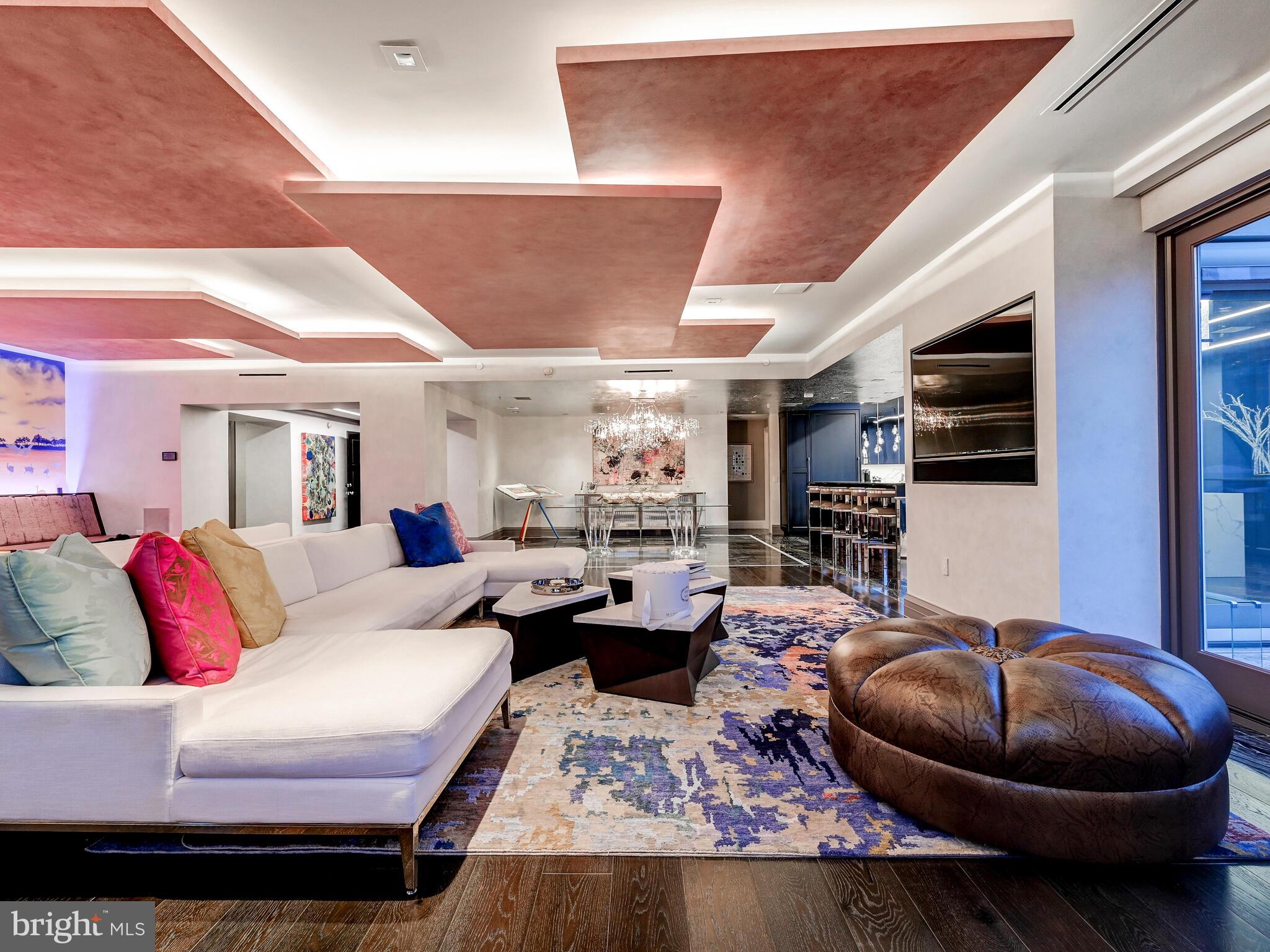 801 Key Highway, Unit P54 Baltimore, MD 21230 - Photo 8 of 81 a living room with furniture and a flat screen tv