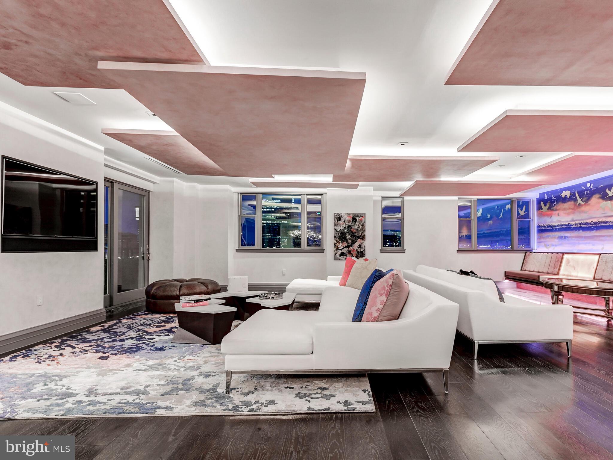 801 Key Highway, Unit P54 Baltimore, MD 21230 - Photo 9 of 81 a living room with furniture window and wooden floor