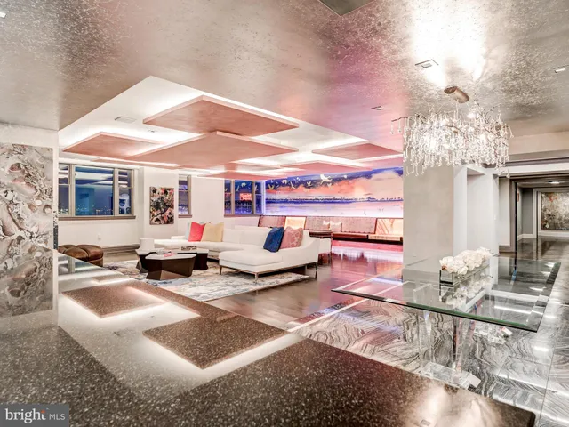 a kitchen with a stove a sink and a refrigerator