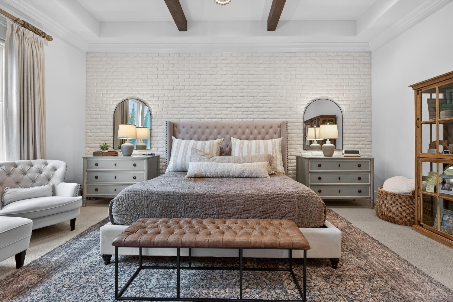 61 Secret Court Lodi, CA 95242 - Photo 29 of 79 a bedroom with a bed and a couch