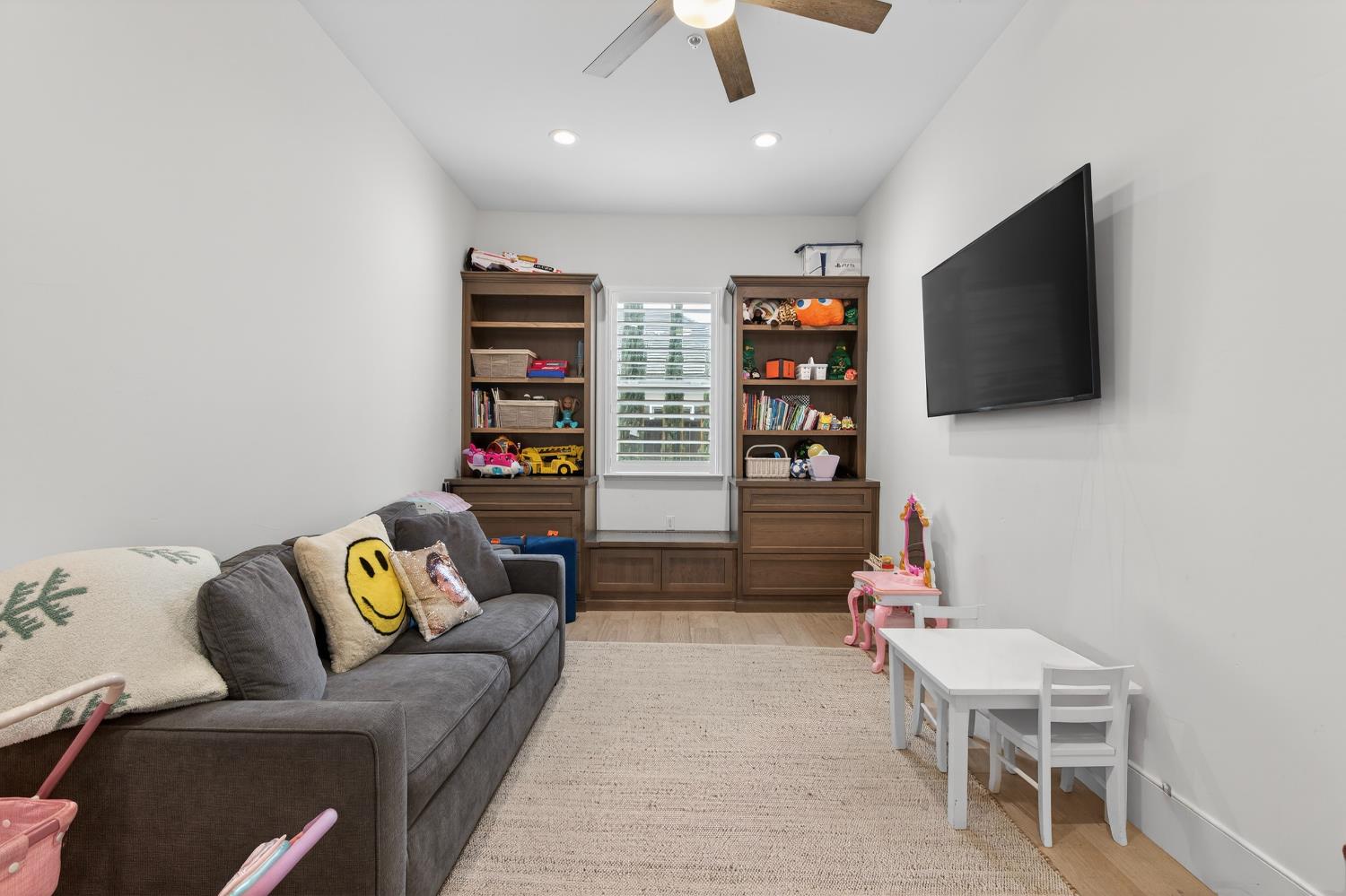 61 Secret Court Lodi, CA 95242 - Photo 43 of 79 a living room with furniture and a flat screen tv
