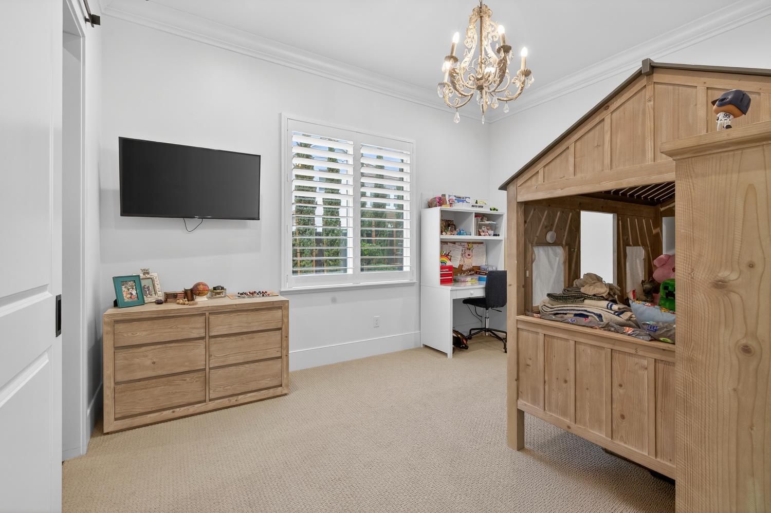 61 Secret Court Lodi, CA 95242 - Photo 45 of 79 a living room with furniture and a flat screen tv
