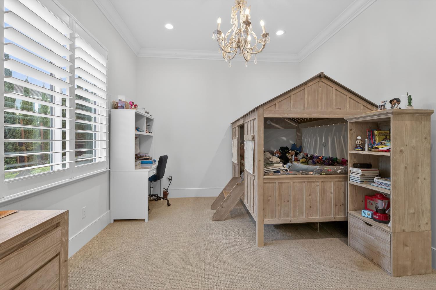 61 Secret Court Lodi, CA 95242 - Photo 46 of 79 a view of living room with furniture and a chandelier