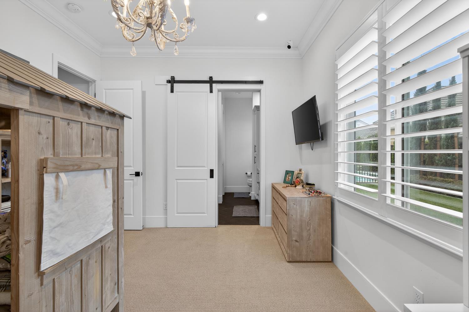 61 Secret Court Lodi, CA 95242 - Photo 47 of 79 a view of a livingroom with furniture and a window
