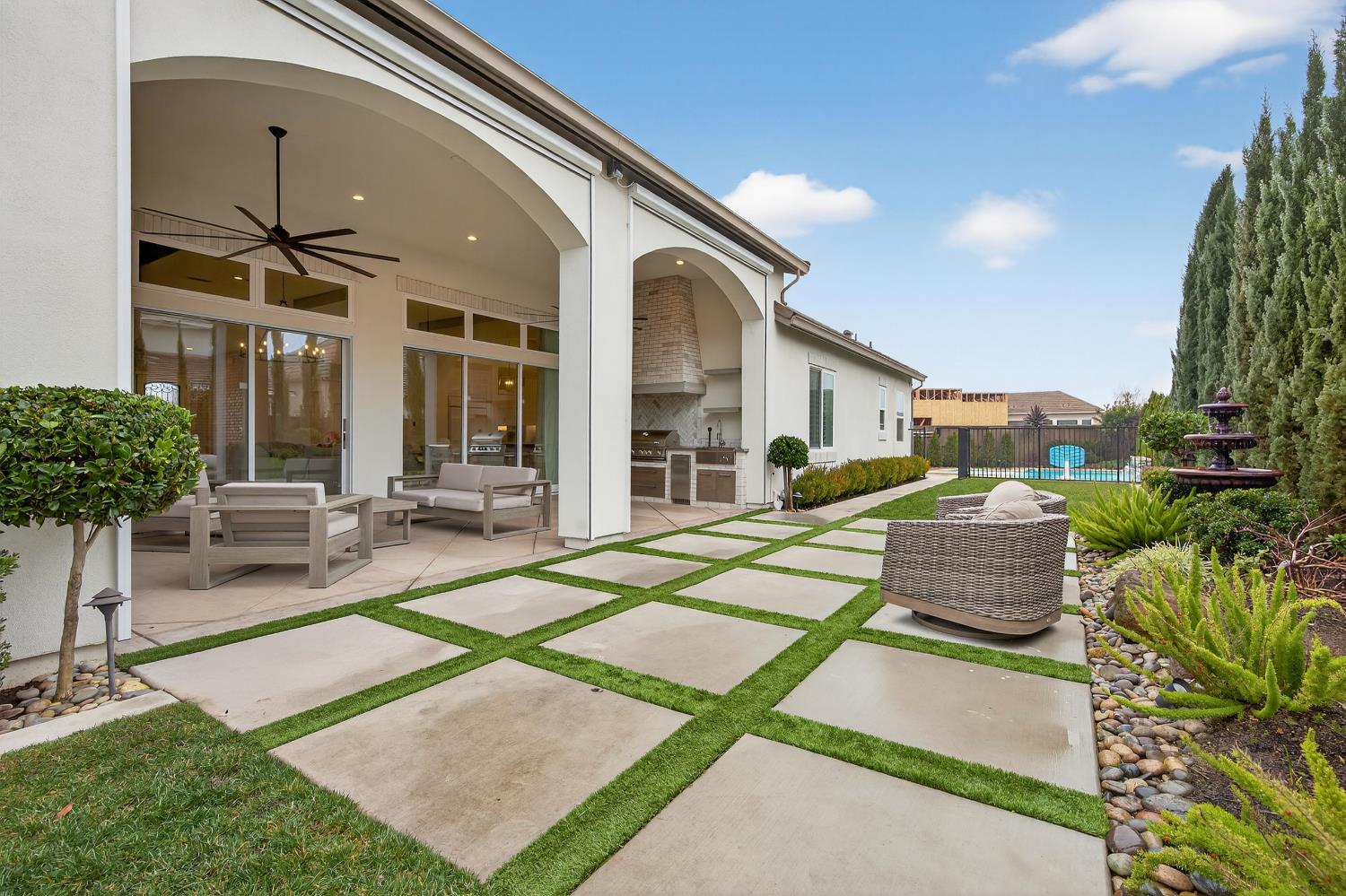 61 Secret Court Lodi, CA 95242 - Photo 61 of 79 a front view of a house with garden