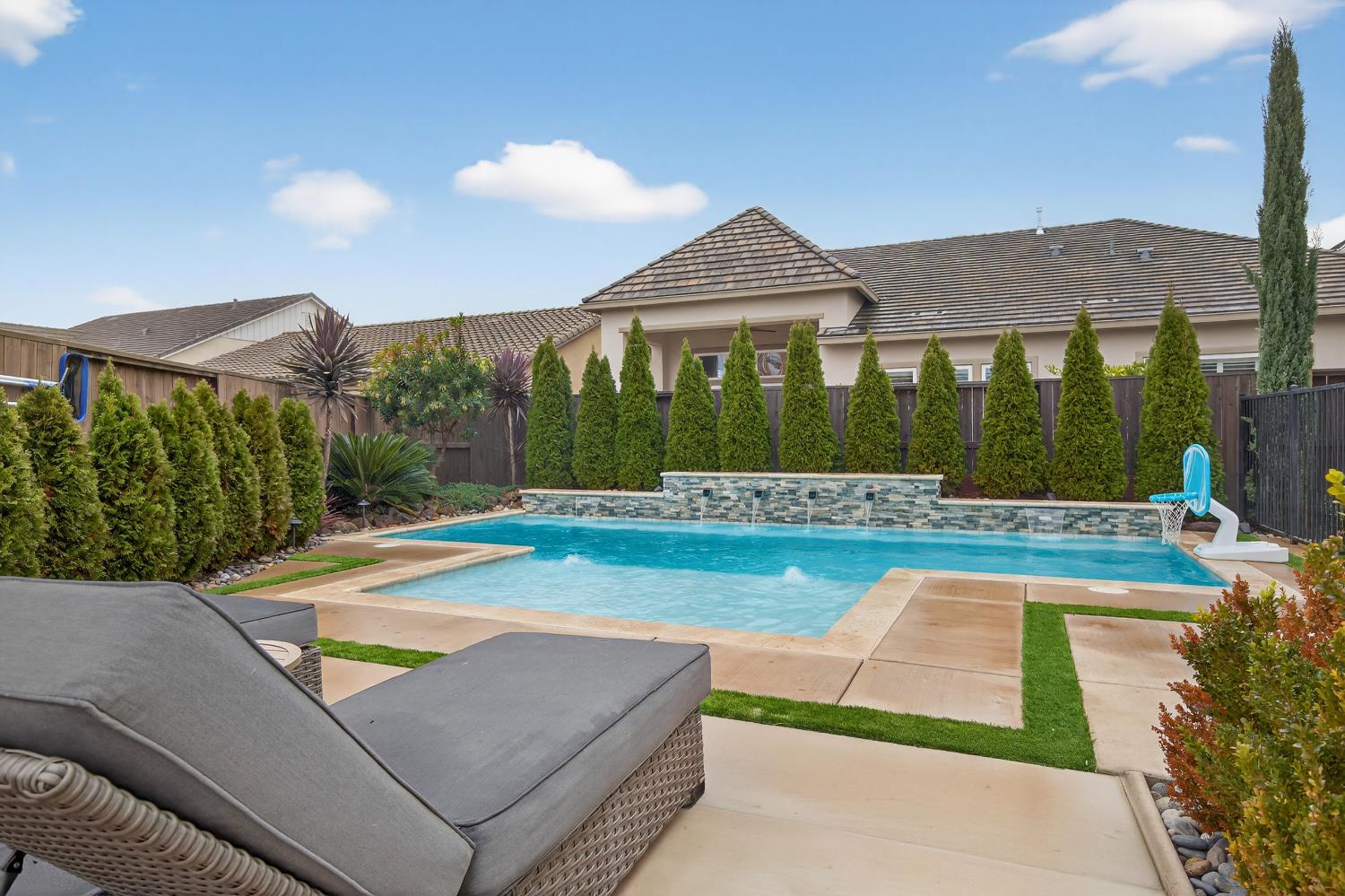 61 Secret Court Lodi, CA 95242 - Photo 65 of 79 a view of a house with swimming pool