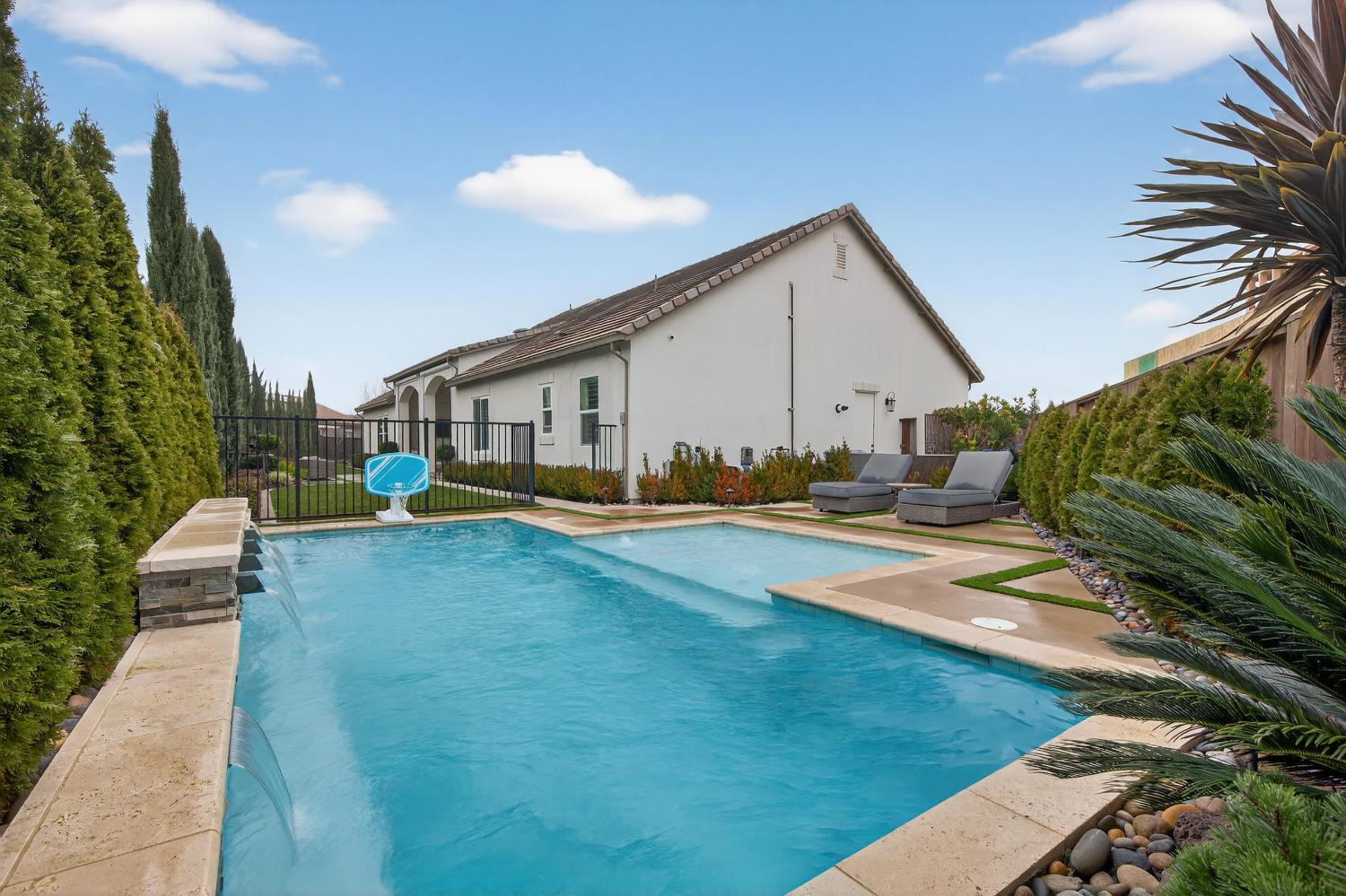 61 Secret Court Lodi, CA 95242 - Photo 66 of 79 a view of a house with swimming pool