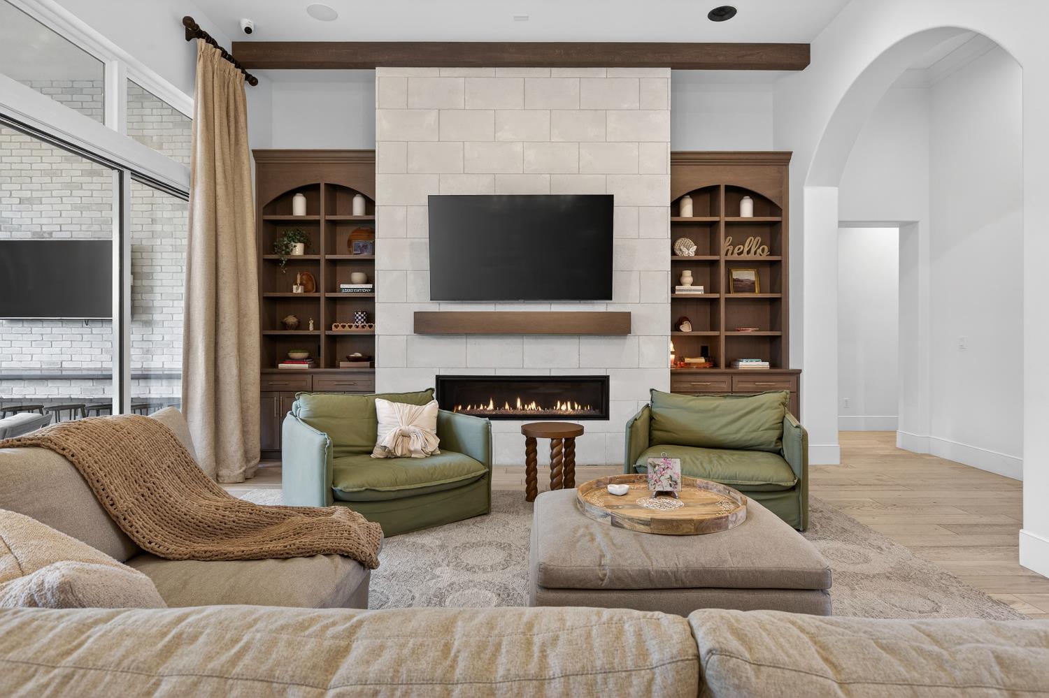 61 Secret Court Lodi, CA 95242 - Photo 7 of 79 a living room with furniture a fireplace and a flat screen tv