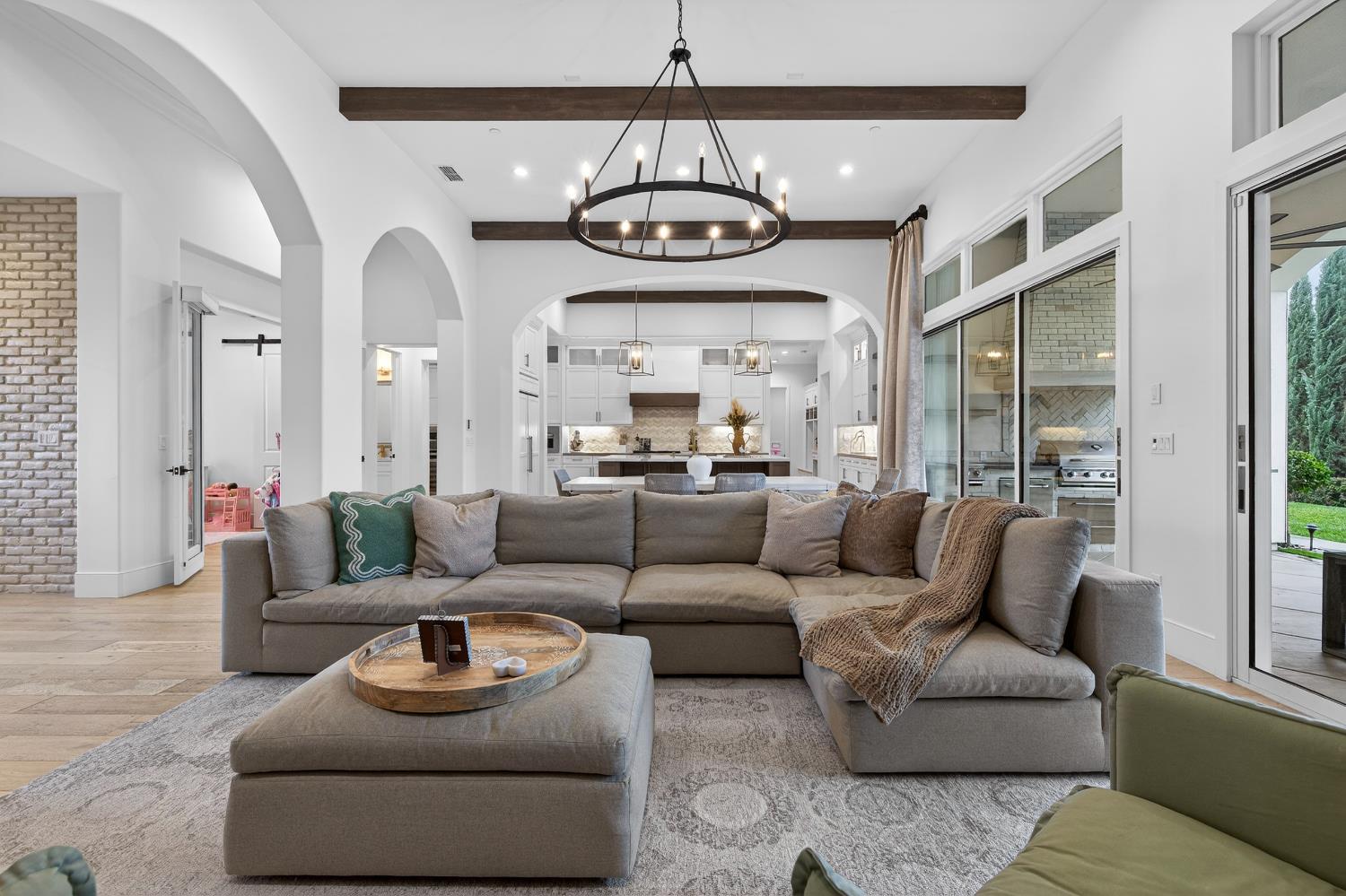 61 Secret Court Lodi, CA 95242 - Photo 10 of 79 a living room with furniture and a large window