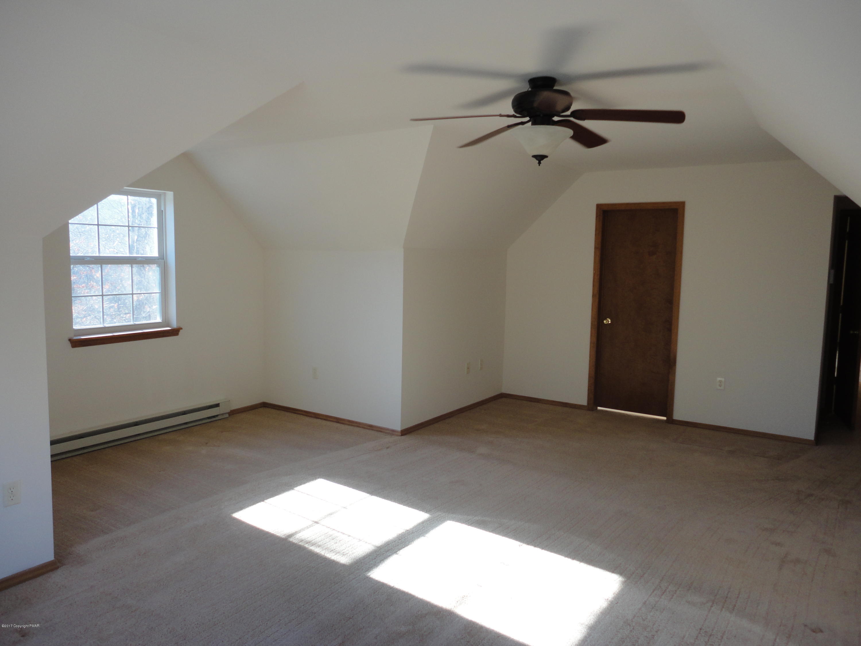 6389 Decker Road Bushkill, PA 18324 - Photo 10 of 22 an empty room with windows and closet