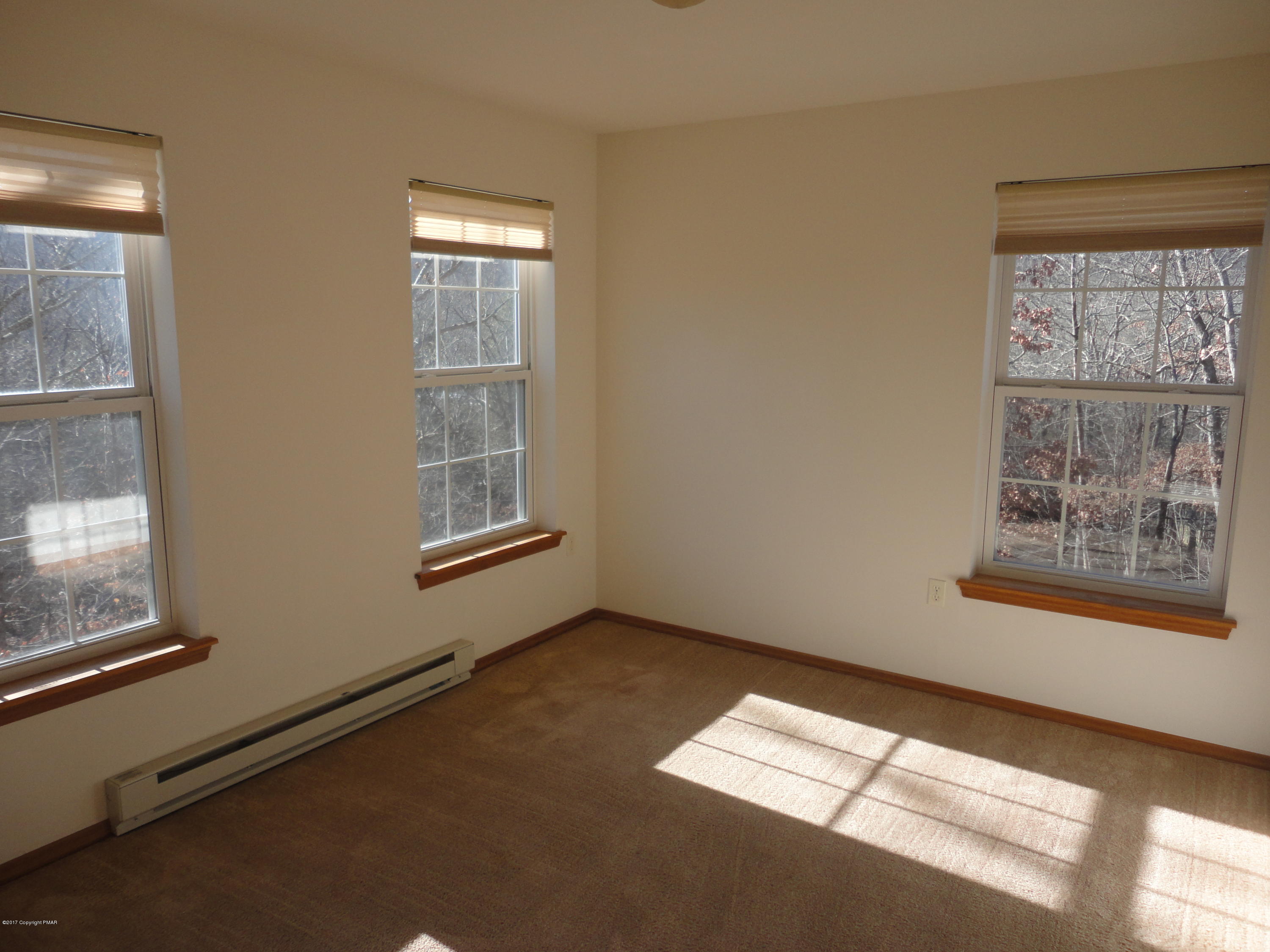 6389 Decker Road Bushkill, PA 18324 - Photo 15 of 22 a view of an empty room with a window
