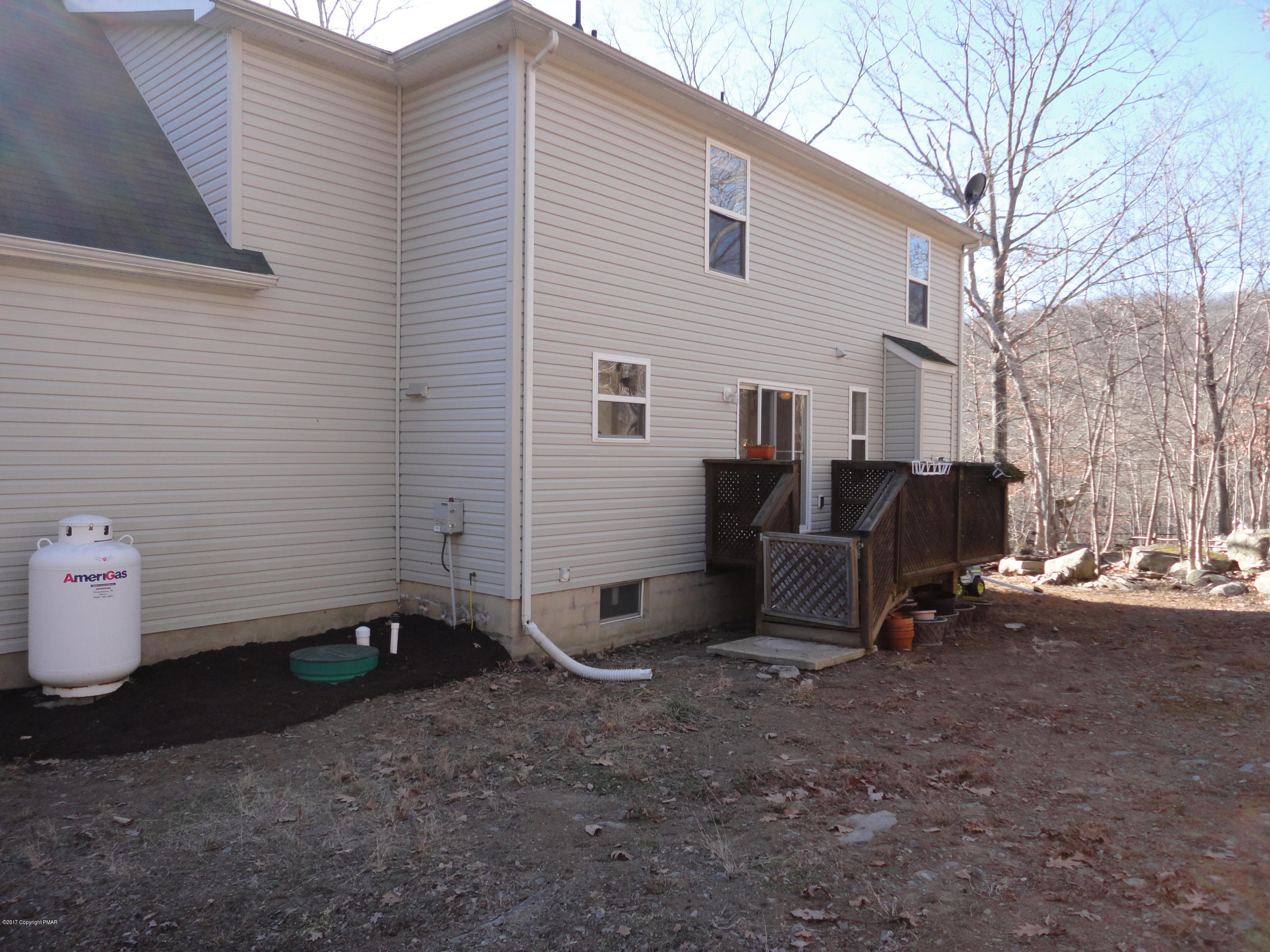 6389 Decker Road Bushkill, PA 18324 - Photo 19 of 22 a view of a back yard of the house