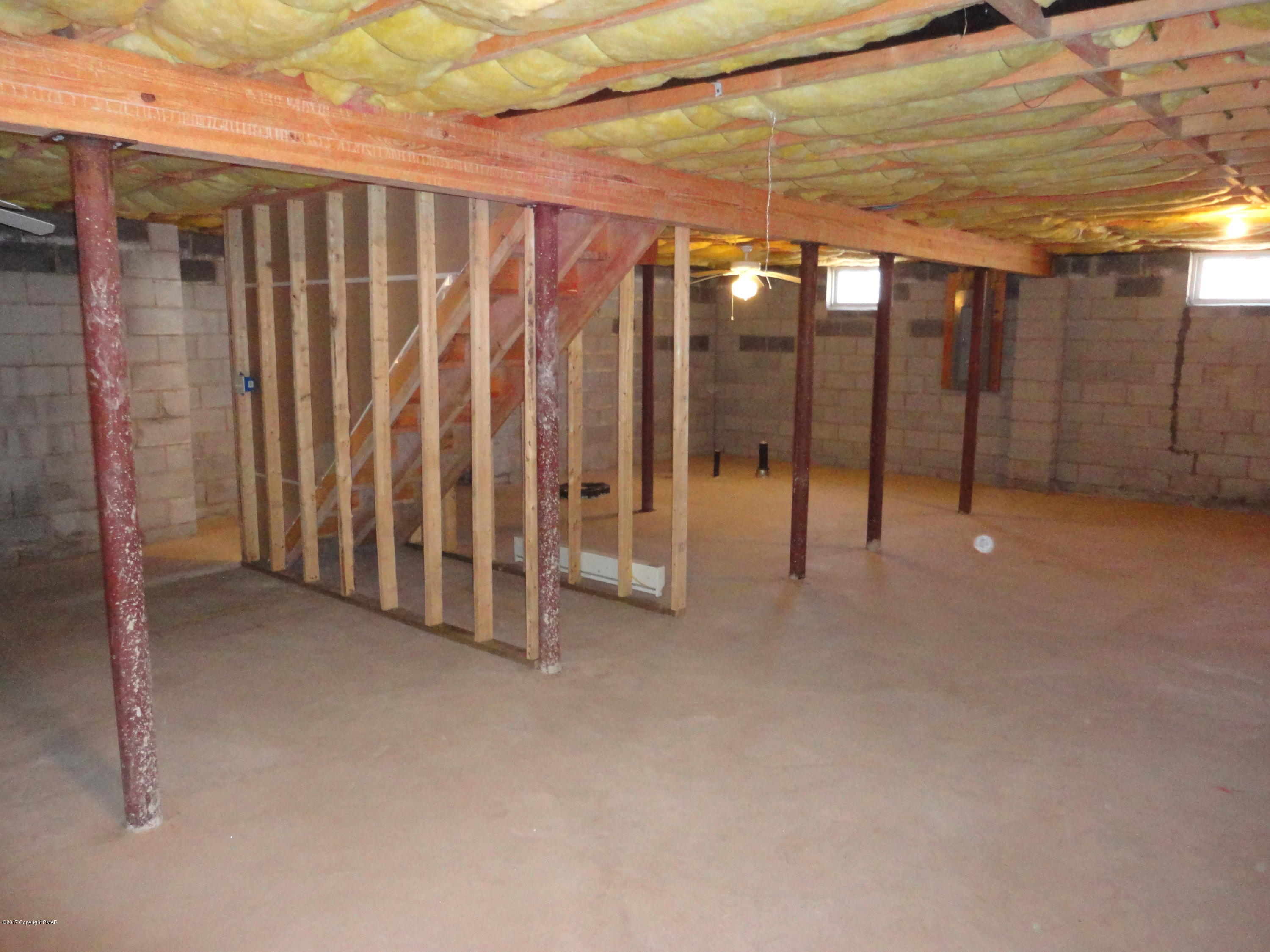 6389 Decker Road Bushkill, PA 18324 - Photo 20 of 22 a view of an empty room with wooden floor