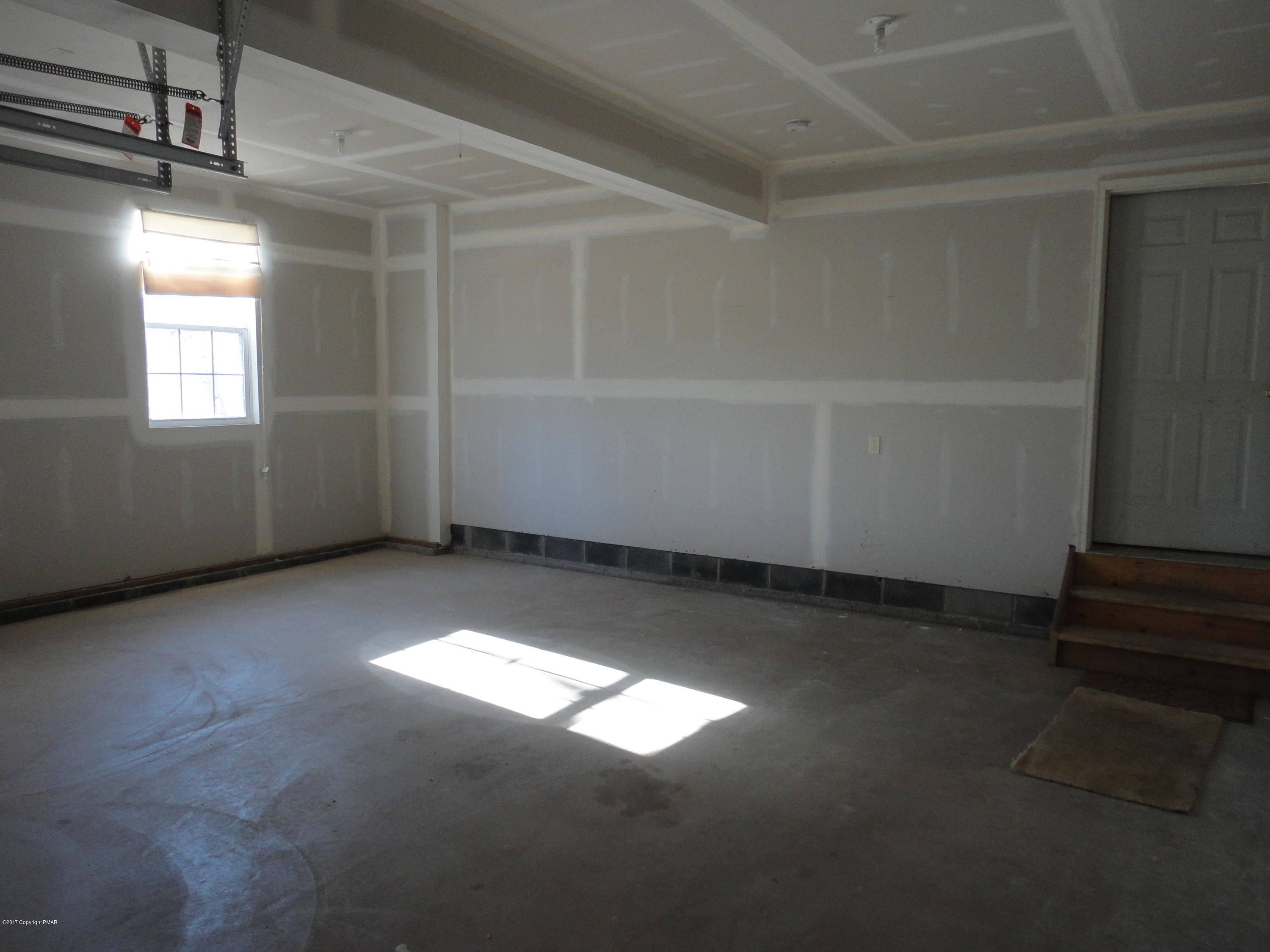 6389 Decker Road Bushkill, PA 18324 - Photo 21 of 22 an empty room with windows