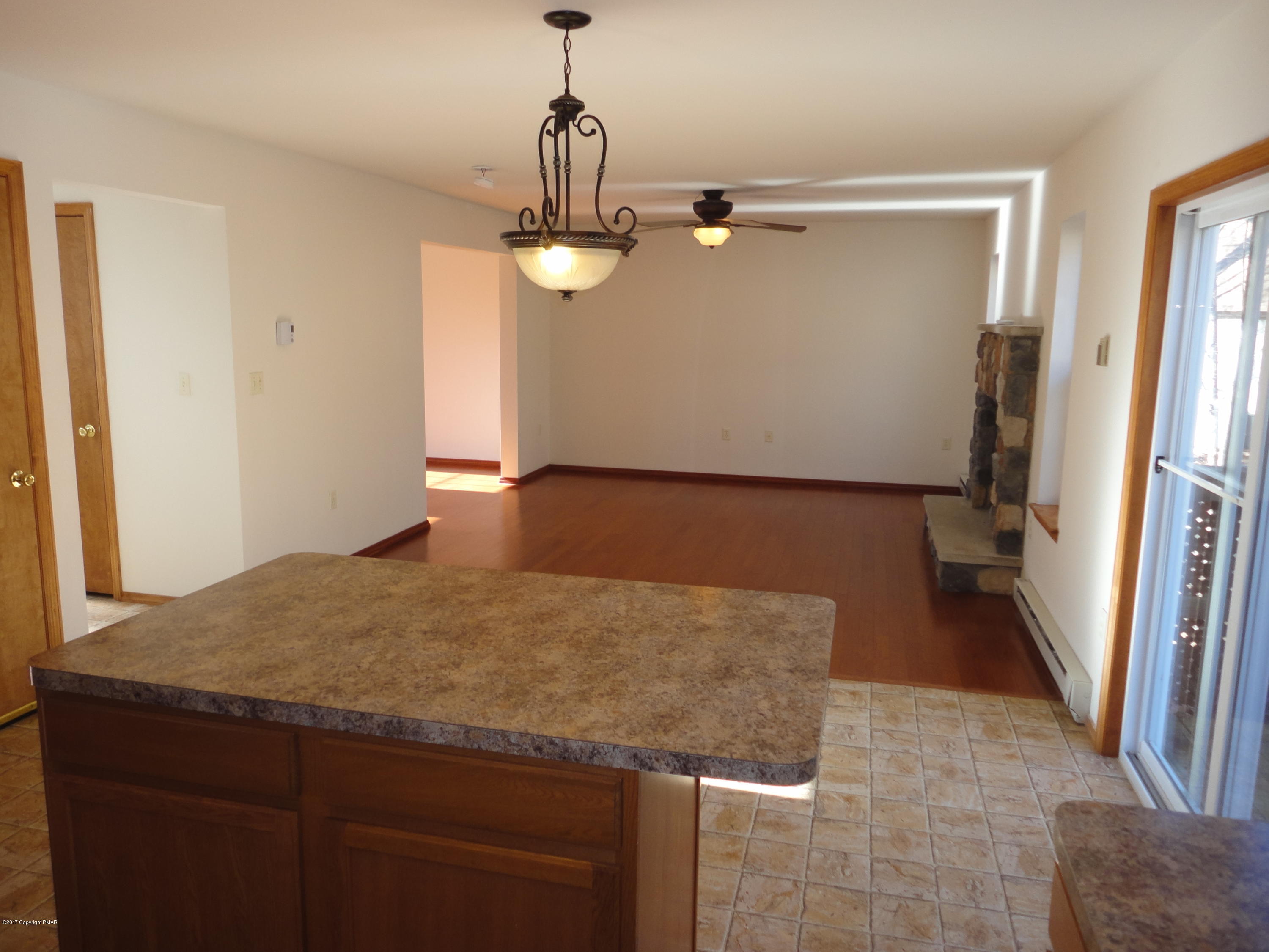 6389 Decker Road Bushkill, PA 18324 - Photo 8 of 22 a view of a kitchen with a sink and dishwasher
