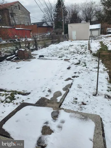 a view of a backyard of a house
